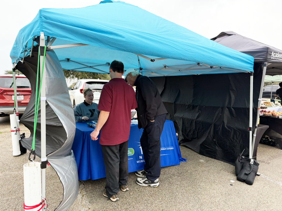 The 183 North Mobility Project team interacts with community members at the Lakeline Farmers Market.