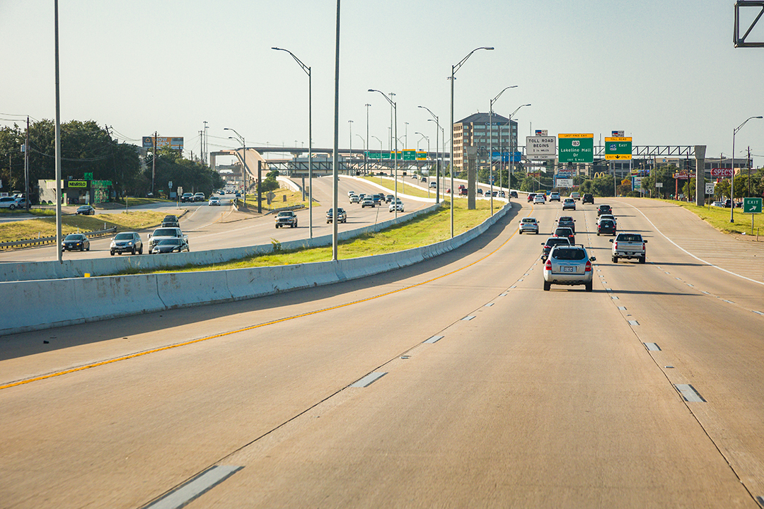 Northbound US 183 general purpose lanes and median near the exit ramp to SH 45.