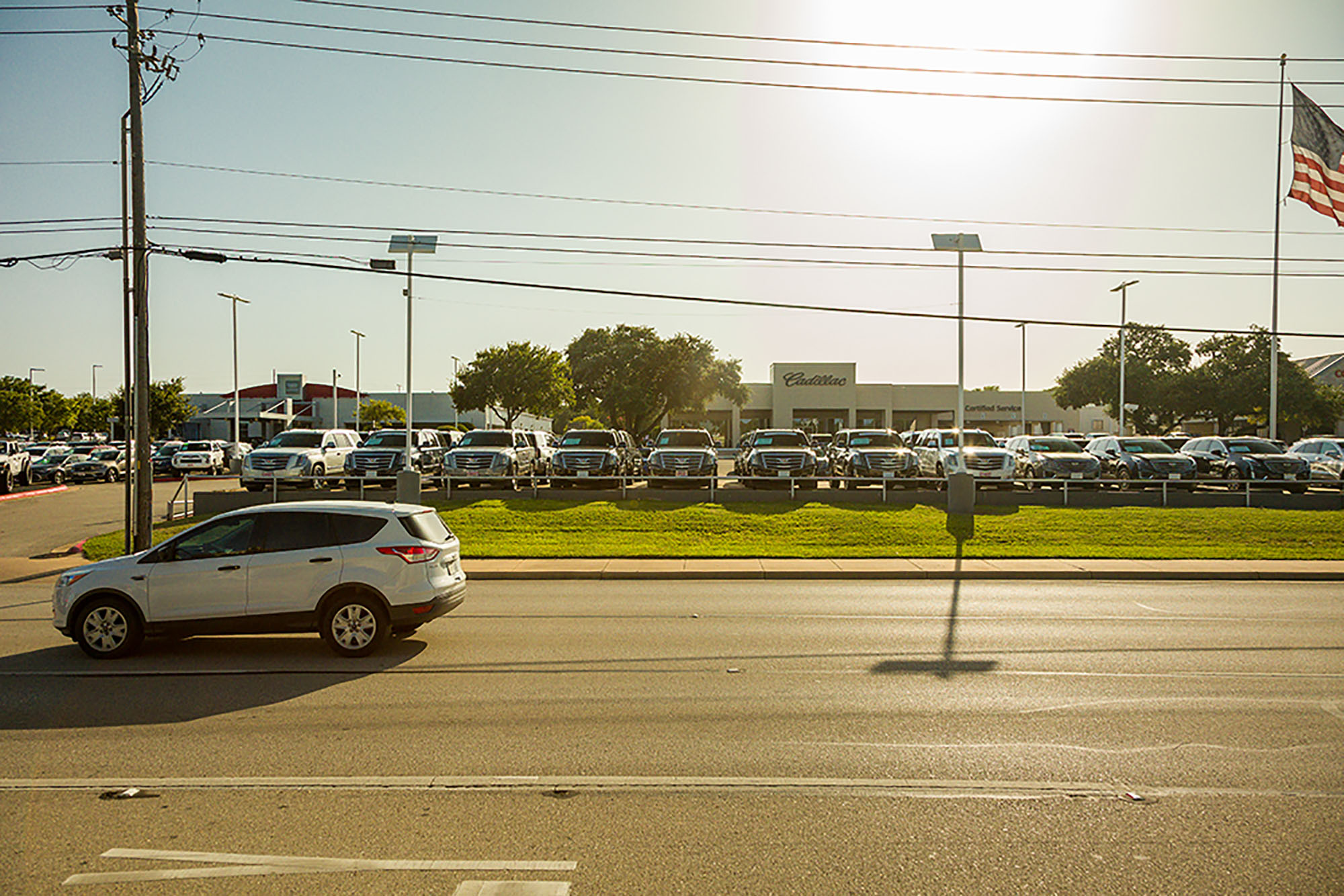 Cadillac dealership and roadway 