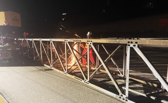 Nightly overhead sign bridge construction on US 183.