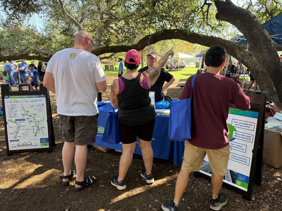 Group visits informational table of three people